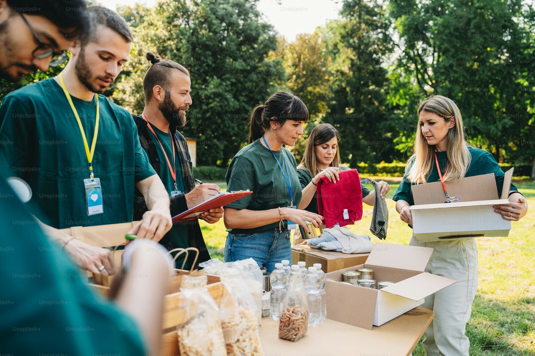 Volunteers packing food boxes for distribution.