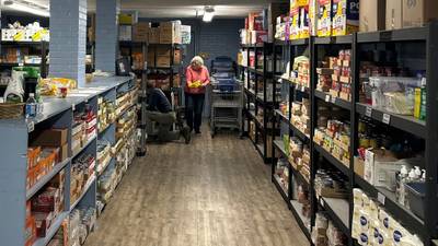 Food For Fairview pantry shelves stocked with food and household items.